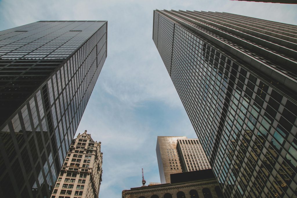 High-rise buildings forming a captivating urban skyline under a clear blue sky.